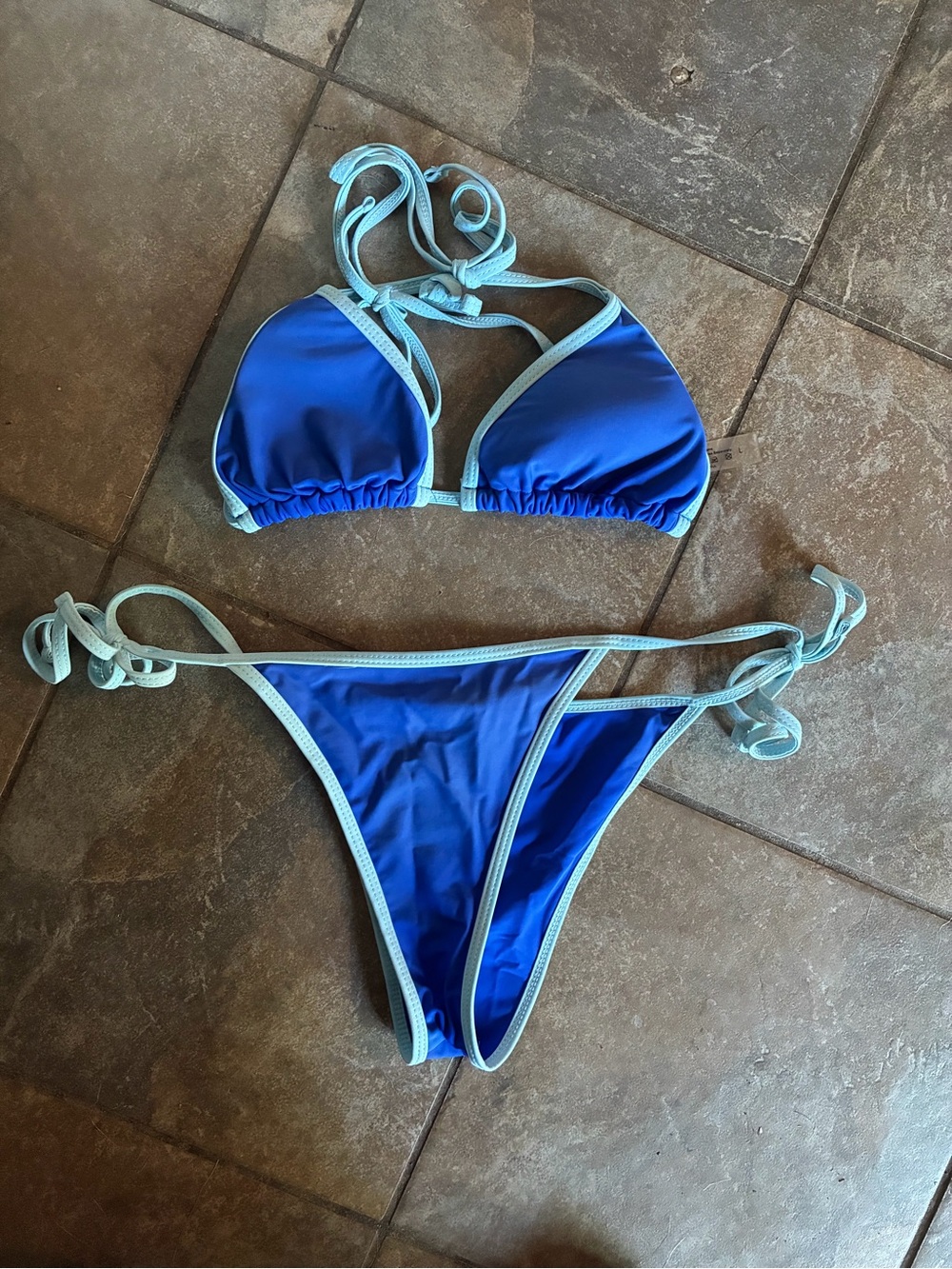 Blue Two-Piece String Bikini with Light Blue Trim